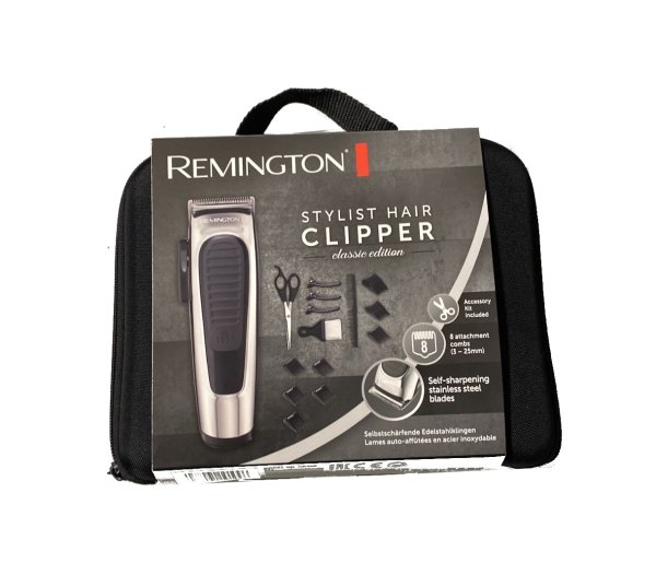 Remington Haarschneidemaschine Profi Classic (selbstschärfende Edelstahlklingen, Klingeneinstellhebel, 8 Aufsteckkämme, Aufbewahrungstasche, Friseur - Set, Netz-/Akkubetrieb) Haarschneider HC450